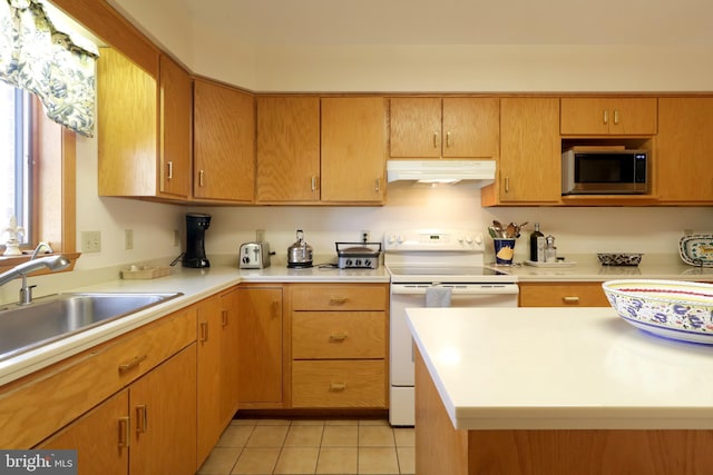 kitchen featuring stainless steel microwave, white electric range, sink, and light tile patterned floors