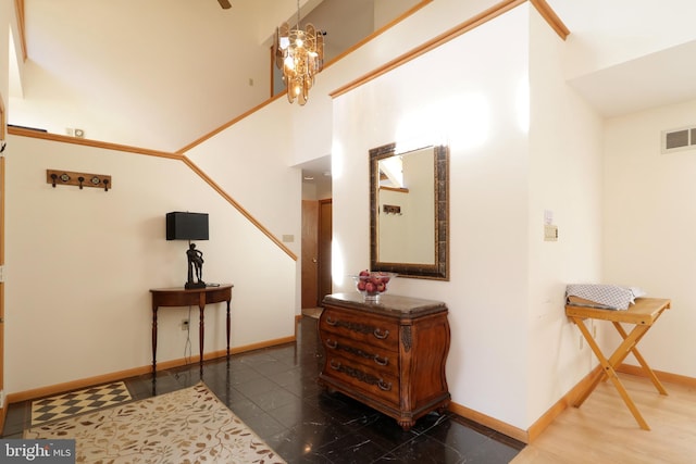 foyer with a notable chandelier