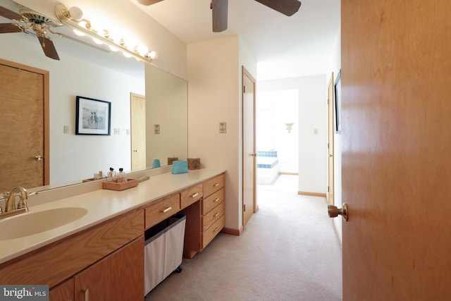 bathroom featuring vanity and ceiling fan