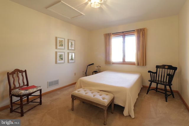 bedroom featuring light colored carpet