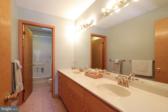 full bathroom with vanity, tile patterned floors, toilet, and shower / bath combination