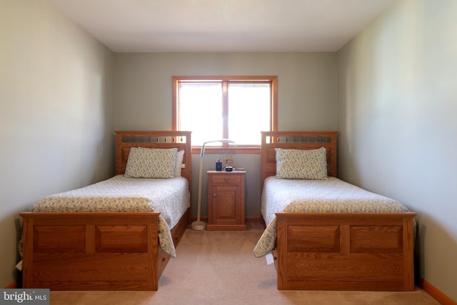 bedroom with light carpet