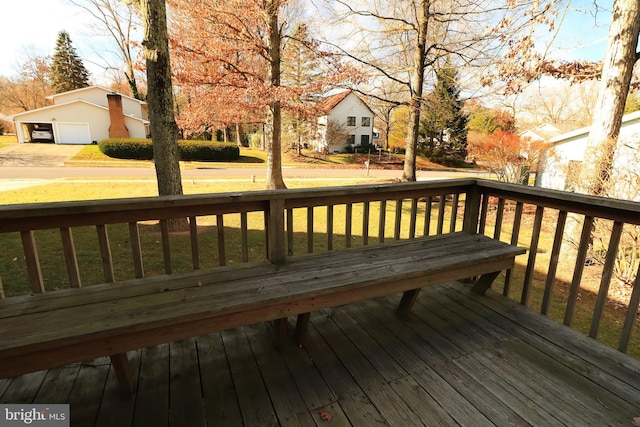 wooden deck with a yard