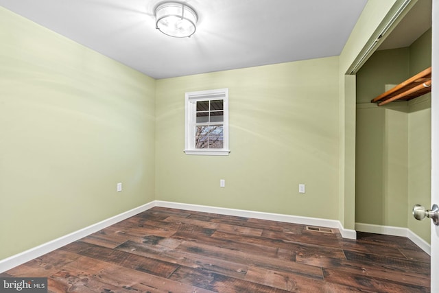 interior space featuring dark wood-type flooring