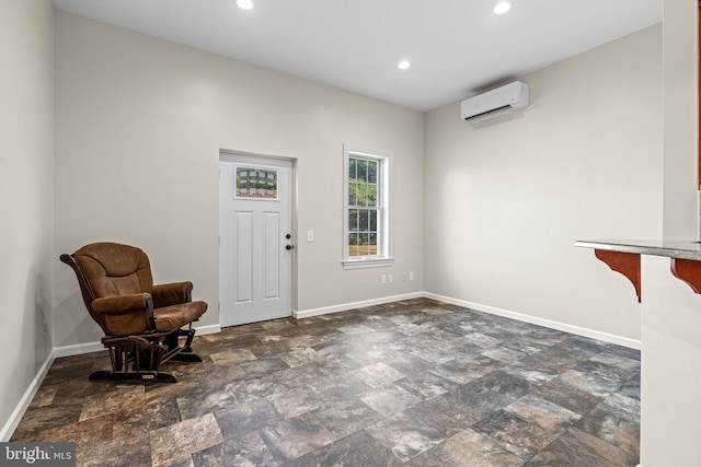 foyer entrance featuring a wall mounted air conditioner