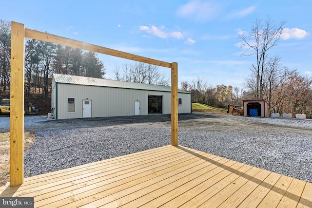 deck featuring an outdoor structure