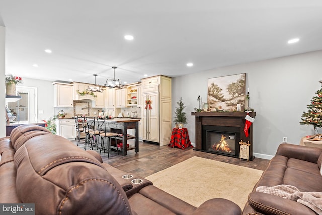 living room with dark hardwood / wood-style floors