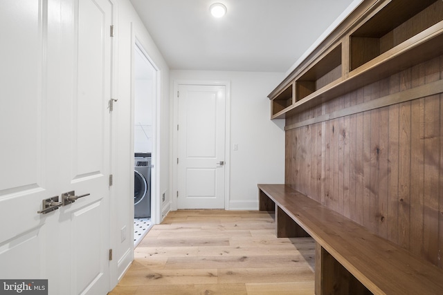 mudroom featuring light hardwood / wood-style flooring and washer / dryer