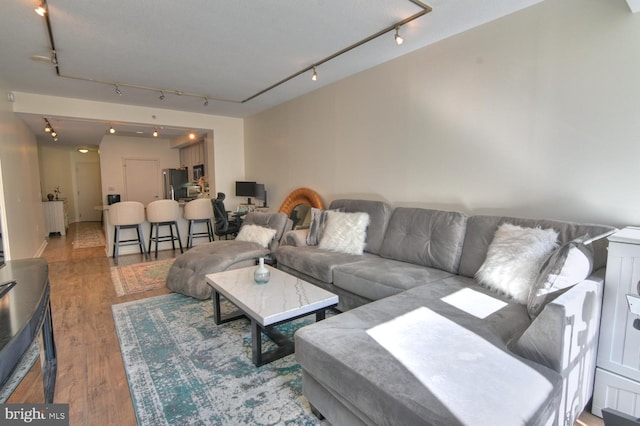 400 Massachusetts Ave NW Unit 423, Washington, DC 20001 - living room featuring rail lighting and wood finished floors