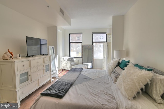 bedroom featuring hardwood / wood-style flooring