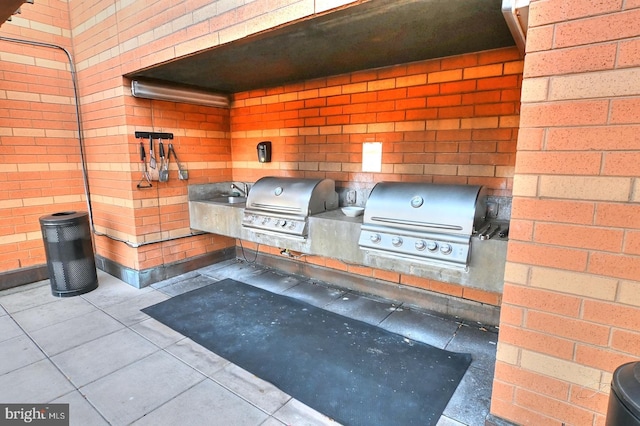 400 Massachusetts Ave NW Unit 423, Washington, DC 20001 - view of patio featuring a grill, area for grilling, and a sink