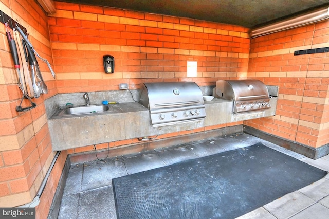 400 Massachusetts Ave NW Unit 423, Washington, DC 20001 - view of patio with grilling area, exterior kitchen, and a sink