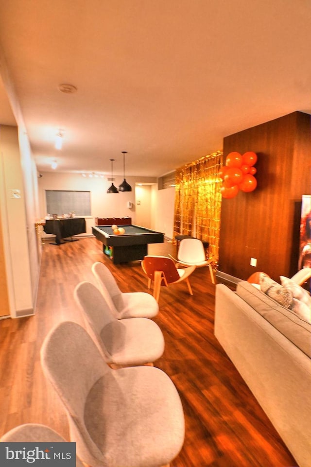 400 Massachusetts Ave NW Unit 423, Washington, DC 20001 - living room with wood finished floors, wood walls, and billiards