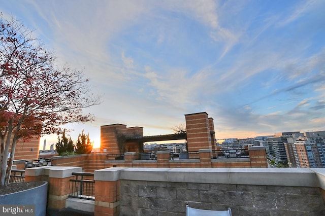 view of patio terrace at dusk