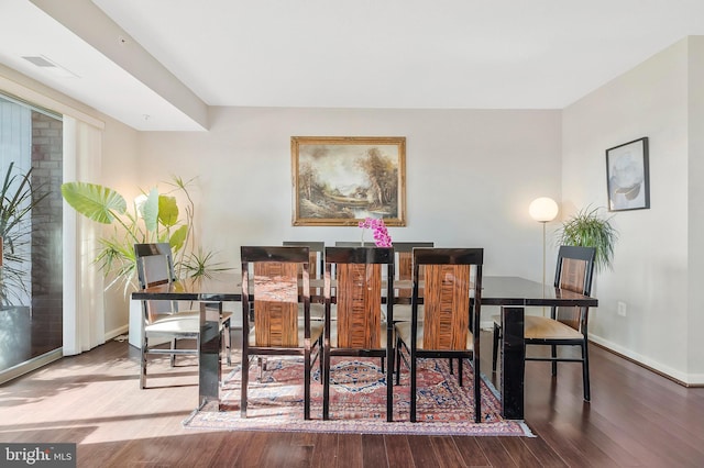 dining area featuring hardwood / wood-style flooring