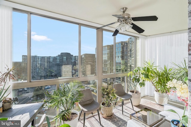 sunroom / solarium with ceiling fan and plenty of natural light