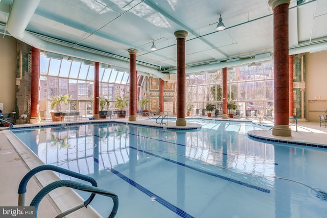 view of pool with ceiling fan