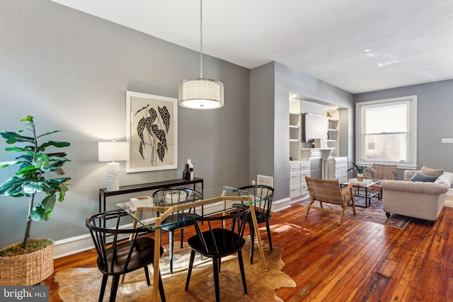 dining area featuring hardwood / wood-style floors