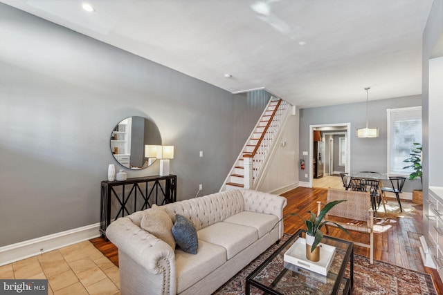 living room with light hardwood / wood-style flooring