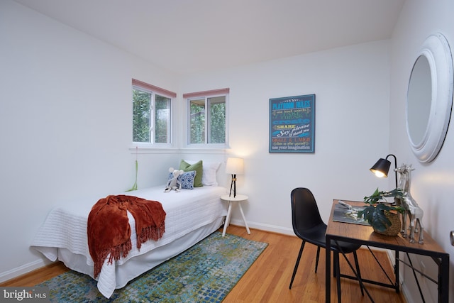 bedroom featuring hardwood / wood-style flooring