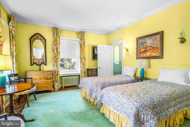 carpeted bedroom featuring radiator and ornamental molding