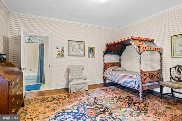 bedroom with ornamental molding and dark wood-type flooring