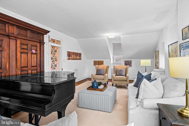 living room featuring vaulted ceiling