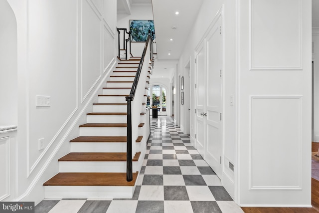 1524 33rd St NW, Washington, DC 20007 - staircase featuring recessed lighting and arched walkways
