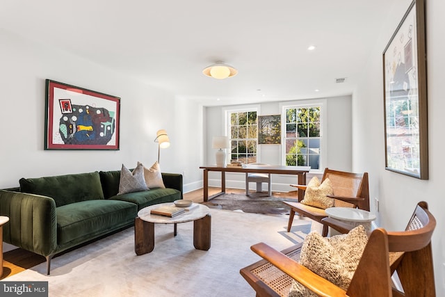 living room with light hardwood / wood-style floors