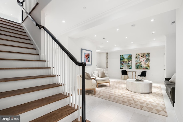 1524 33rd St NW, Washington, DC 20007 - stairway with crown molding, recessed lighting, and tile patterned flooring