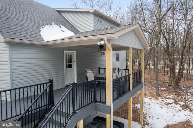 view of snow covered deck