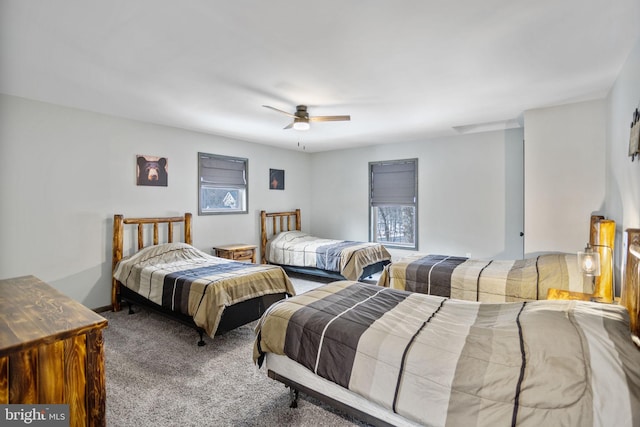 bedroom featuring ceiling fan and carpet flooring