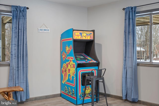 recreation room with hardwood / wood-style flooring