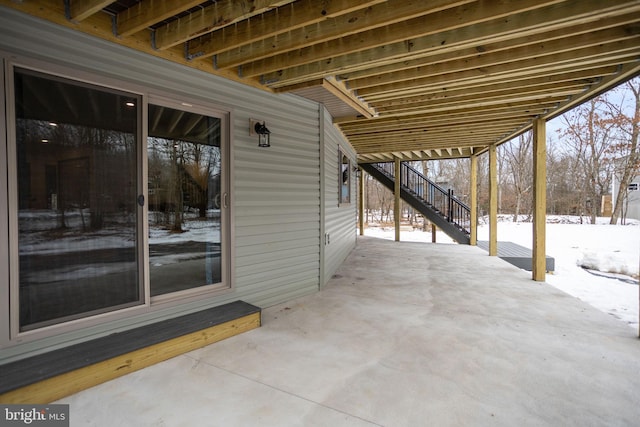 view of snow covered patio