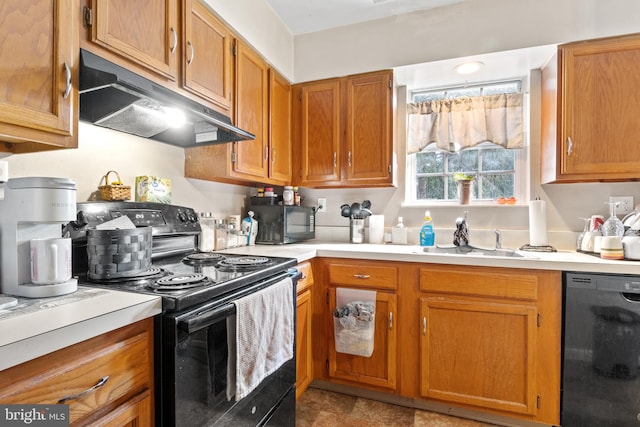 kitchen with black appliances and sink