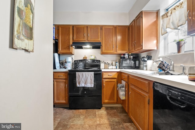 kitchen with black appliances and sink