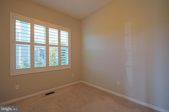 view of carpeted spare room