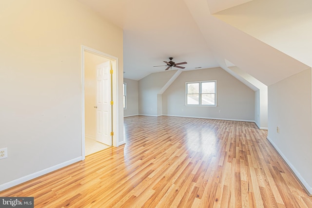 bonus room featuring ceiling fan, vaulted ceiling, and light hardwood / wood-style flooring