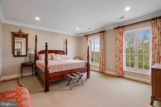 bedroom featuring crown molding and light colored carpet