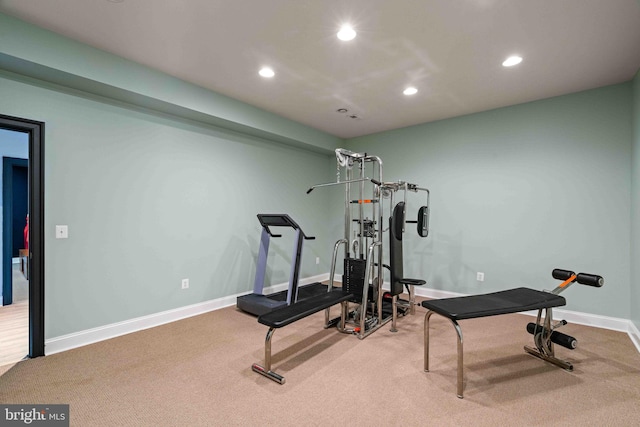 workout area featuring carpet