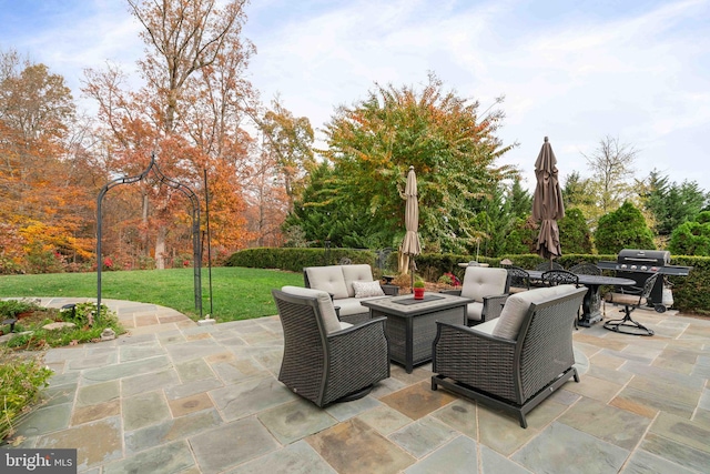 view of patio featuring a grill and an outdoor living space