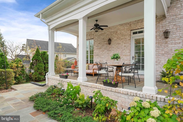 view of patio / terrace featuring ceiling fan