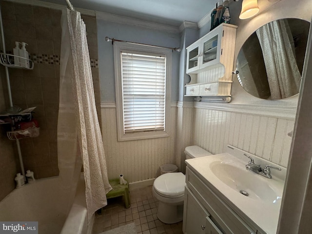 full bathroom with toilet, tile patterned flooring, ornamental molding, and vanity