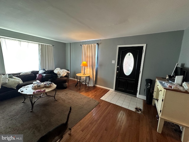 foyer entrance with light hardwood / wood-style floors