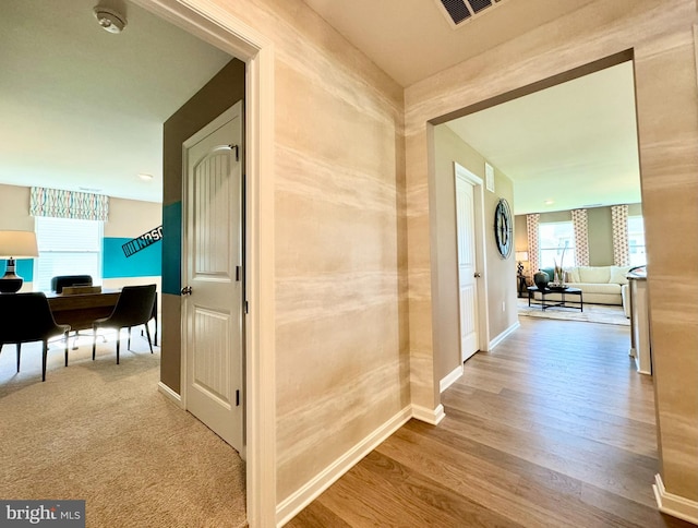 hallway featuring light wood-type flooring