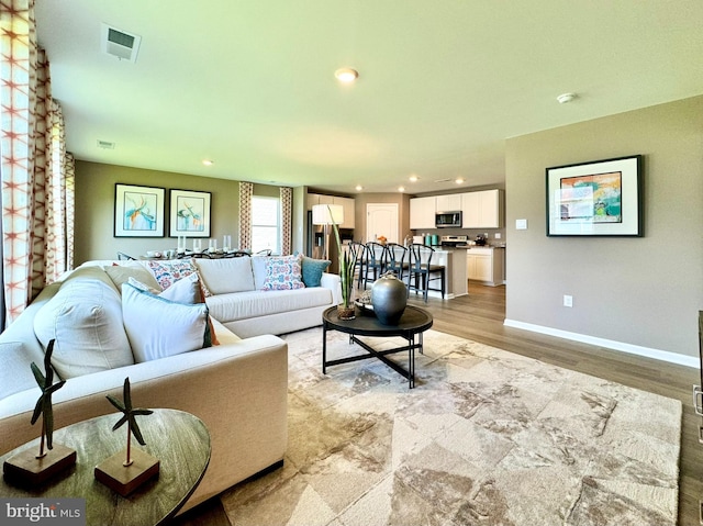 living room featuring light hardwood / wood-style flooring