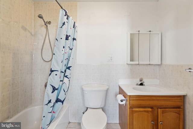 full bathroom with toilet, vanity, shower / tub combo with curtain, and tile walls