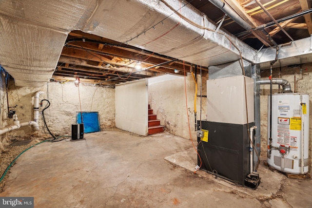 basement featuring heating unit and gas water heater