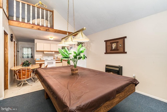 dining room featuring carpet flooring, vaulted ceiling, and billiards