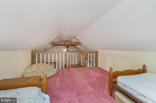 carpeted bedroom featuring vaulted ceiling and ceiling fan